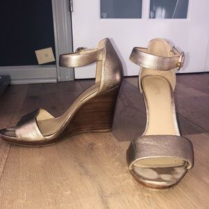 Beautiful Michael Kors gold wedges